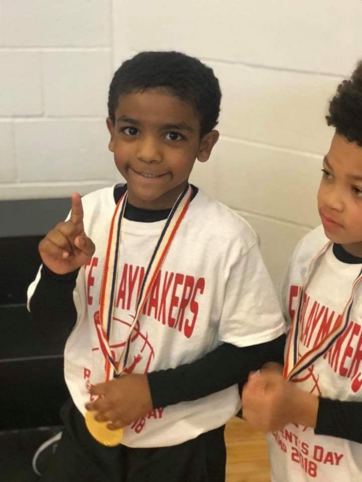 Elite Playmakers 2018 player with a medal
