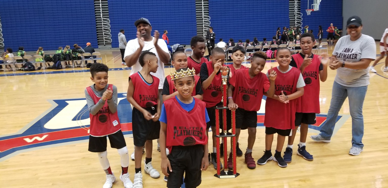 Elite Playmakers 2018 youth champions celebrating with trophy