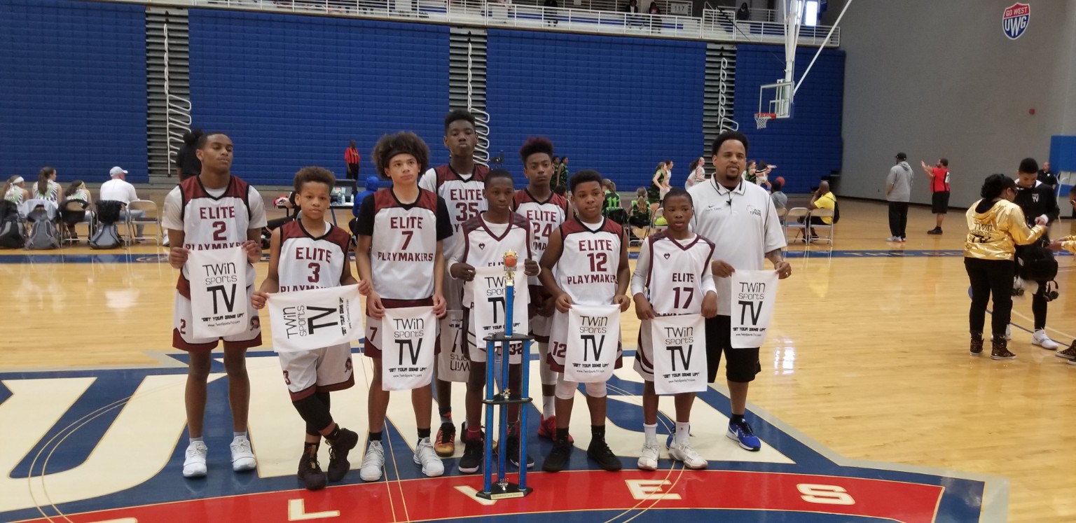 Elite Playmakers 2018 tournament team with trophy