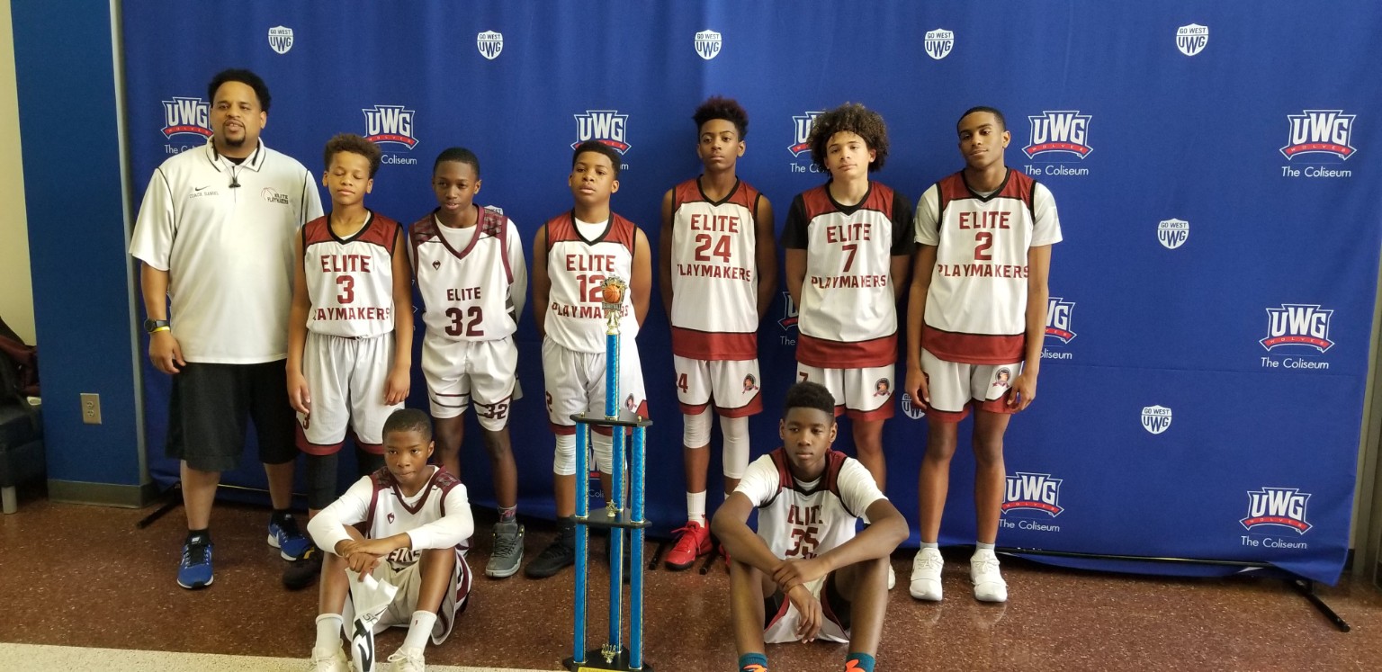 Elite Playmakers 2018 team and coach with trophy at UWG