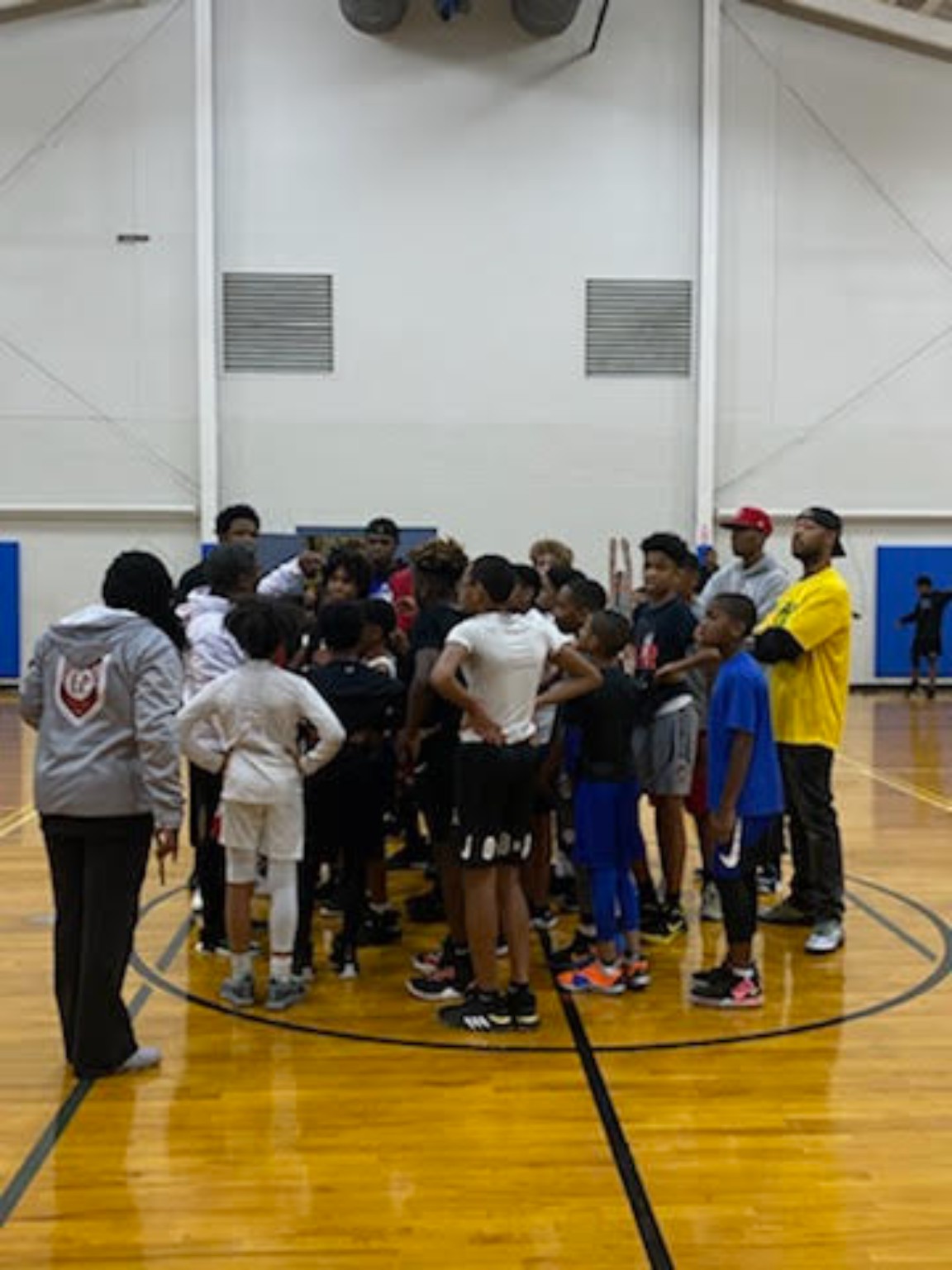 Elite Playmakers 2020 team meeting on the court